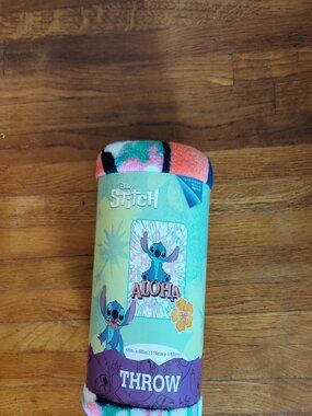 New Stitch Throw Blanket